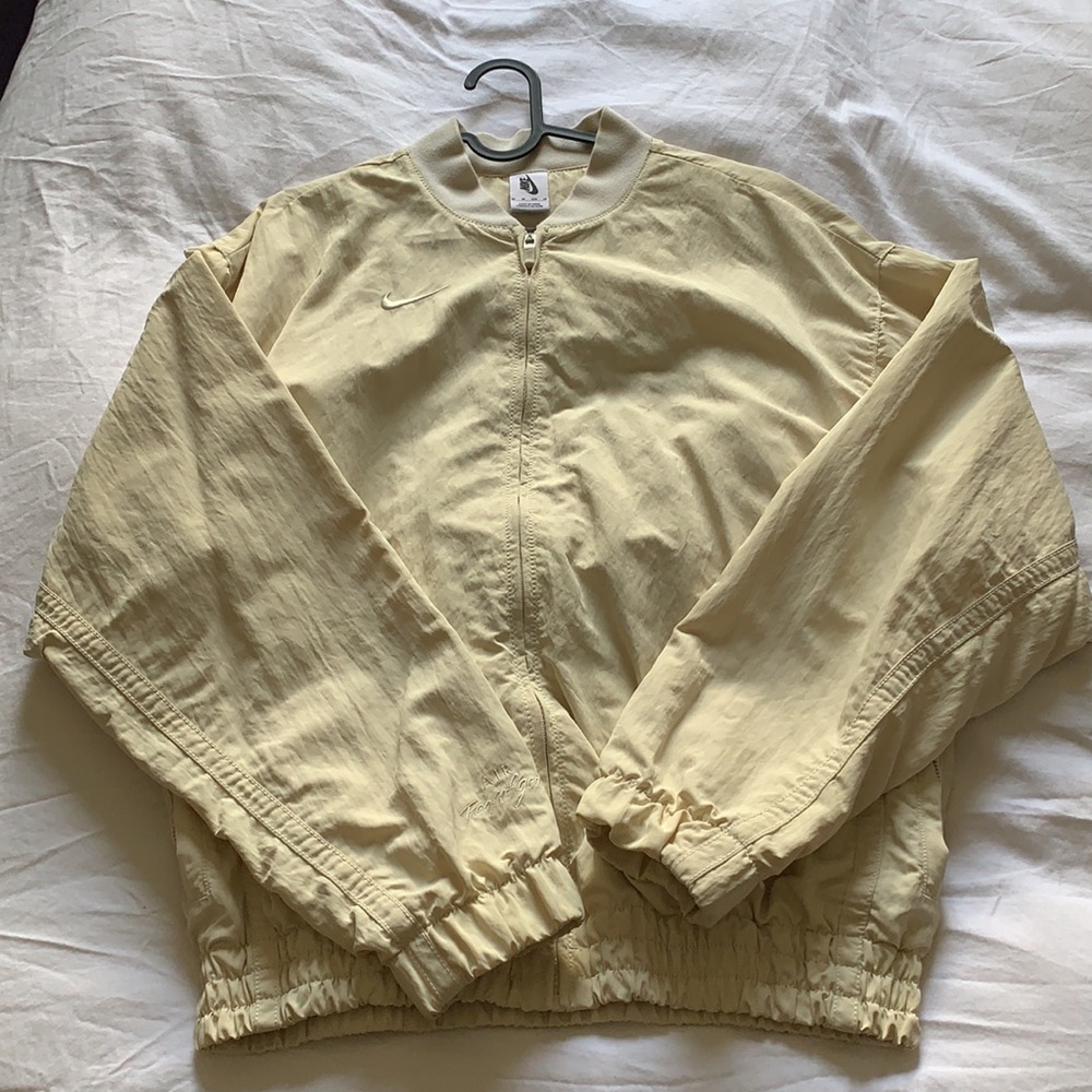 Nike x Fear of God light cream basketball jacket